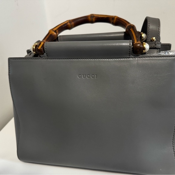 Gucci Handbags - Preowned Gucci Gray Leather Satchel with Bamboo Handle and crossbody strap